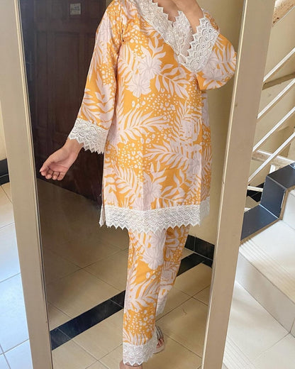 "Elegant Floral Lace Trimmed Yellow Kurta Set"